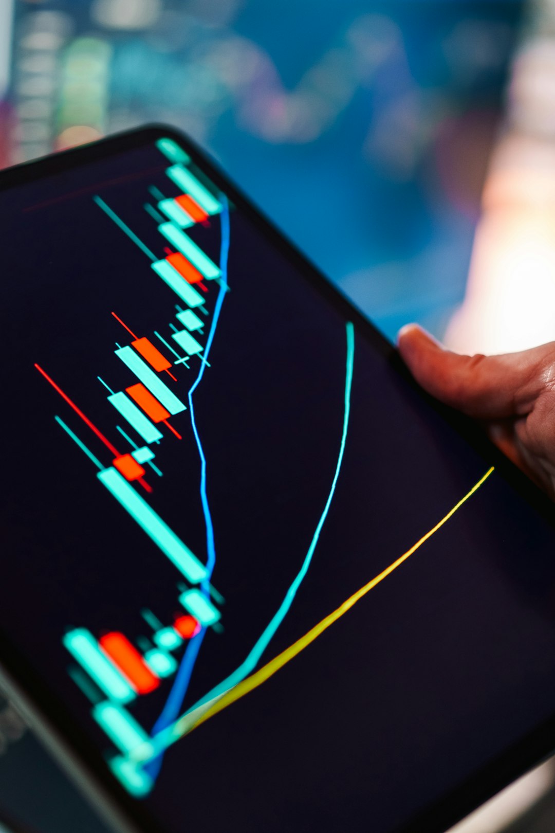 services-03 Financial trading candlestick chart tablet market analysis tablet screen Close up tablet screen showing rising price movement technical indicators trend lines digital finance data visualization investment technology editorial concept
